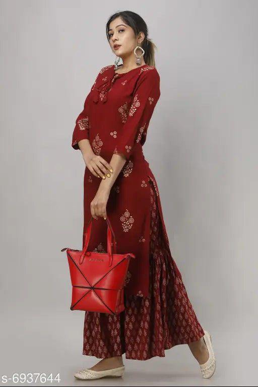 Women's printed rayon kurta with sharara, vibrant net pattern on three-quarter sleeves rayon fabric