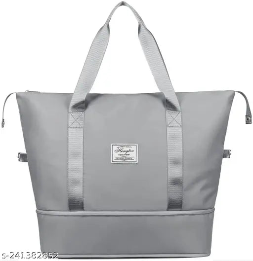 Grey foldable travel duffel bag, lightweight waterproof polyester, large capacity for yoga, women, girls, ideal for gym and sports, waterproof bottom extension, easy to carry with hand or shoulder strap