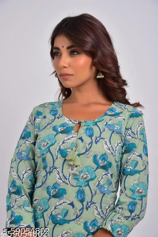 Green pure cotton straight kurta for plus size women, featuring a crepe texture and three-quarter sleeves. Swasti brand, solid combo design, size XXL (bust 44in, length 46in)