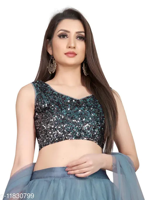 Grey net A-line ceremonial lehenga with sequined unstitched blouse, embellished topwear and solid dupatta. Semi-stitched Indian traditional wear