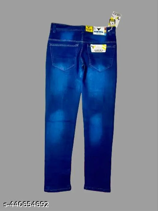 Deep blue distressed denim jeans with teddy bear patch, sparkling embellishments, and Indian origin