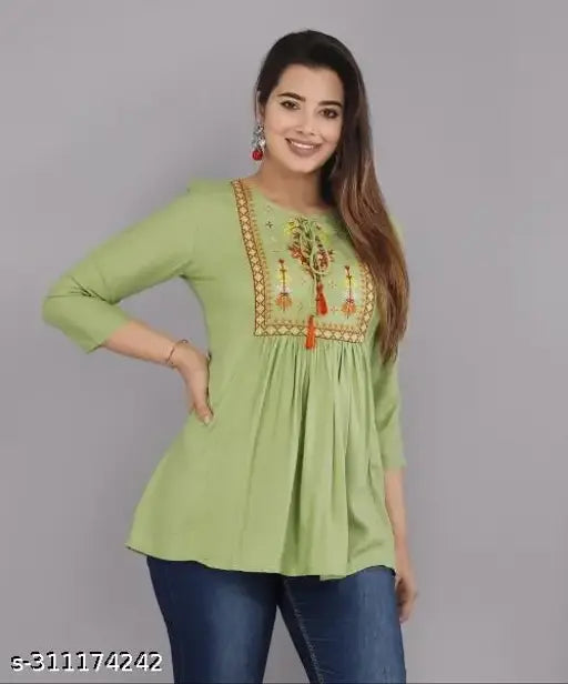 Attractive embroidered rayon top for women, three-quarter sleeves, size S (36 in bust). Indian ethnic wear in soft colors, stylish and comfortable