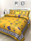 Yellow cotton floral Jaipuri double bed sheets with 2 pillow covers, vibrant flower print on display