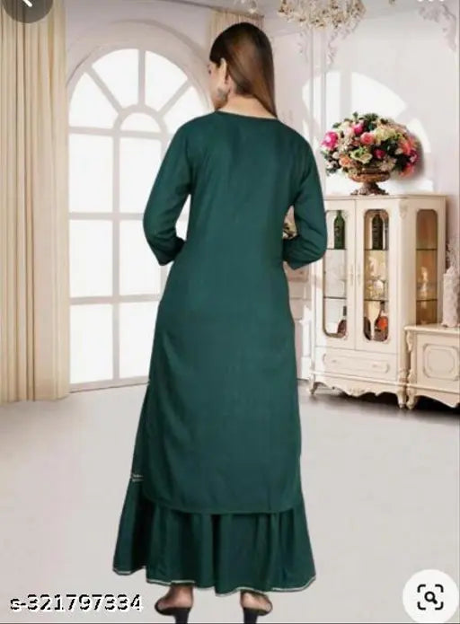 Green rayon embellished kurta with bottomwear, three-quarter sleeves, Indian fashion on mannequin