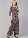 Black multi-printed rayon top with palazzo set for women, featuring three-quarter sleeves and a printed design of a woman's dress. Soft, lightweight, machine washable, and suitable for various occasions. India origin