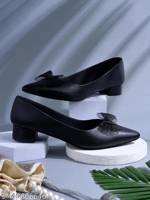 Synthetic pointed toe bow sandals for women & girls in black, slip-on style with classic bellies, Indian origin