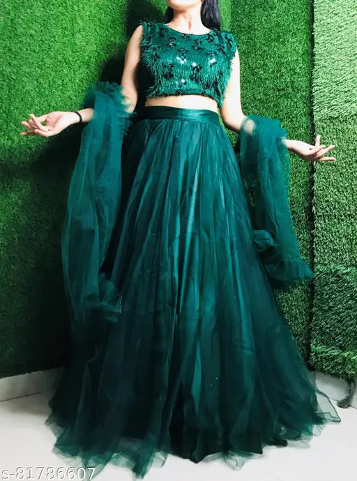 Green jute silk lehenga-choli with embroidered patterns, paired with a net dupatta for traditional Indian weddings or events