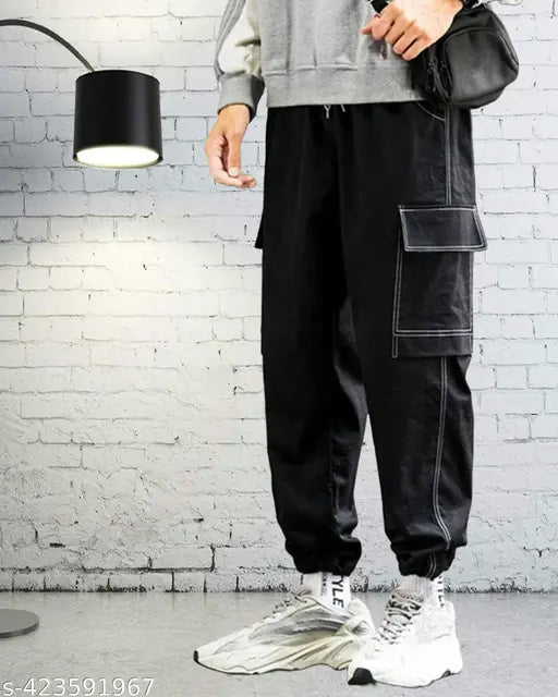 Black Lycra men's baggy jeans joggers, versatile zip cargo style for athleisure wear. Made from cotton and linen blends, perfect for workout sessions or casual outings. Available in sizes 28-34 (waist 28in, length 39in, hip 38in). Origin: India