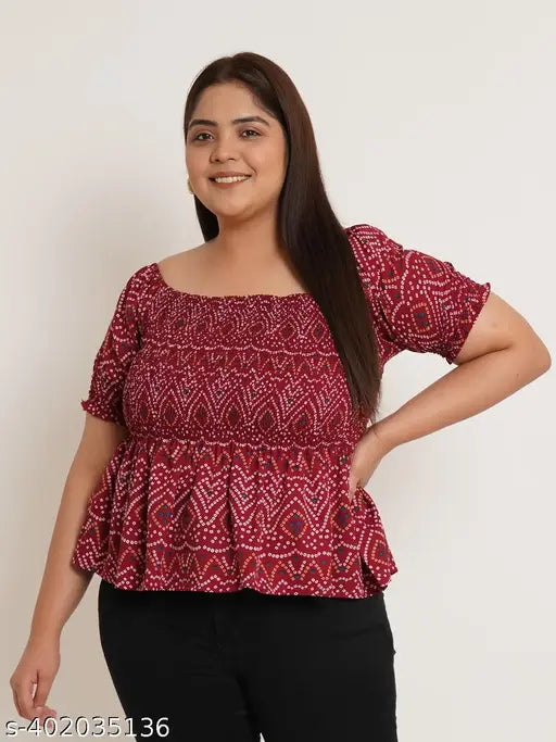 Maroon plus size Bandhani print smocked crepe cinched waist top, ethnic motifs, square neck, short sleeves, woven in India