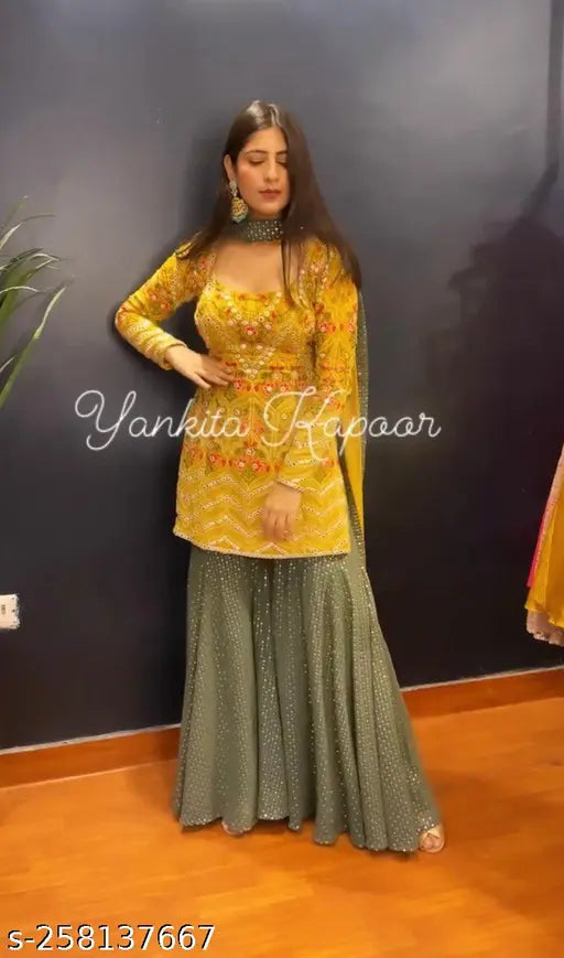 Georgette kurta with heavy embroidery and riyal mirror work, full sleeves, Indian handcrafted traditional outfit on mannequin