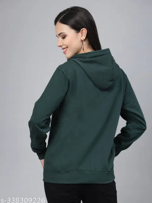 Green cotton oversized sweatshirt with hood by Style Quotient, full sleeves and relaxed fit