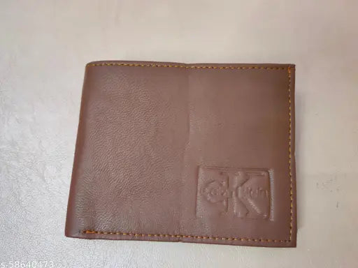 Brown textured leather men's wallet (3 compartments), featuring credit, debit, and visiting card pockets, currency compartment, perfect for daily essentials. Free size (11cm x 9cm). Modern, sophisticated design, ideal gift. Made in India