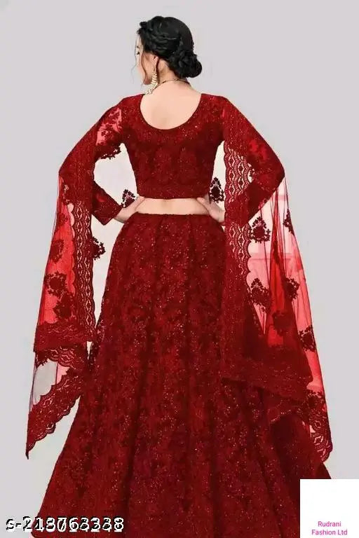 Maroon net lehenga set with embroidered top, bottom, and dupatta. Semi-stitched size 42x44 in or unstitched option available, made in India." (108 characters)