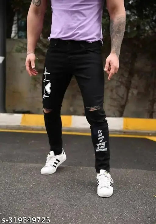 Designer Monster printed jeans, men's slim fit black knee-cut with solid denim option. Indian denim fashion for modern men on display