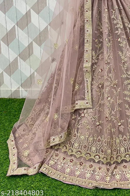 Embroidered lavender lehenga choli set, semi-stitched Zari work for festival/wedding occasions. Free size with net fabric topwear and bottomwear