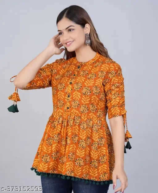 Rayon trending forever short kurti, three-quarter sleeves, printed combo. Women's ethnic wear in soft colors for party wear