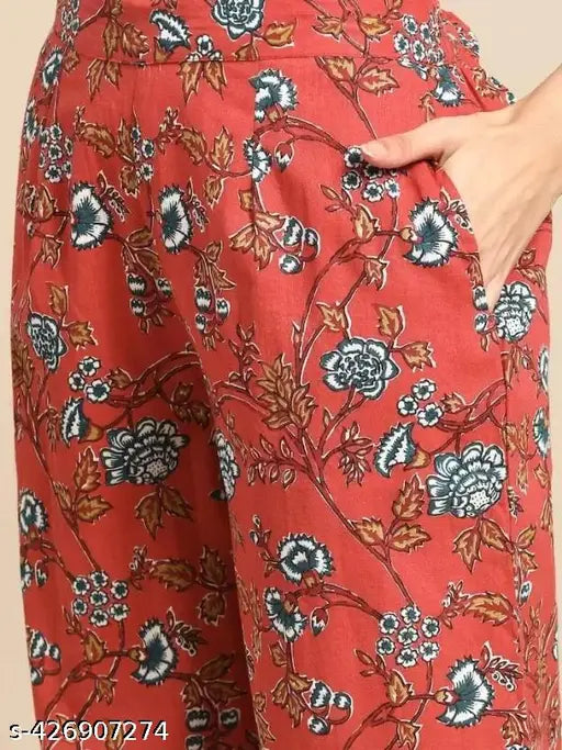 New orange rayon Kurta set with printed net Palazzos, three-quarter sleeves, fits sizes M-XXL. Indian ethnic wear