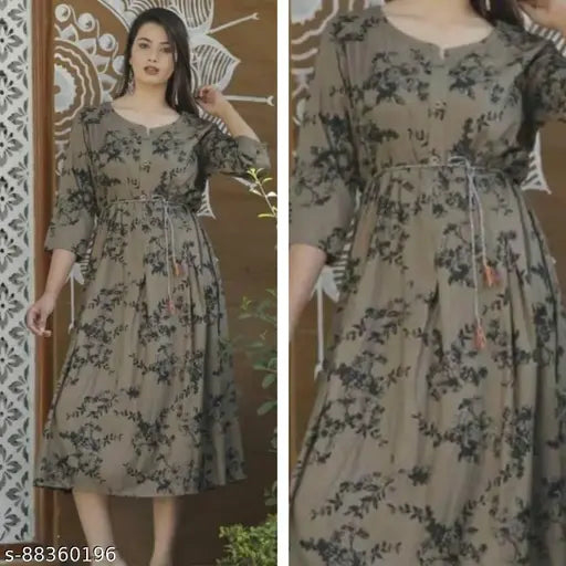 Rayon three-quarter sleeve printed kurti for women, featuring taasel and belt detail, Indian origin