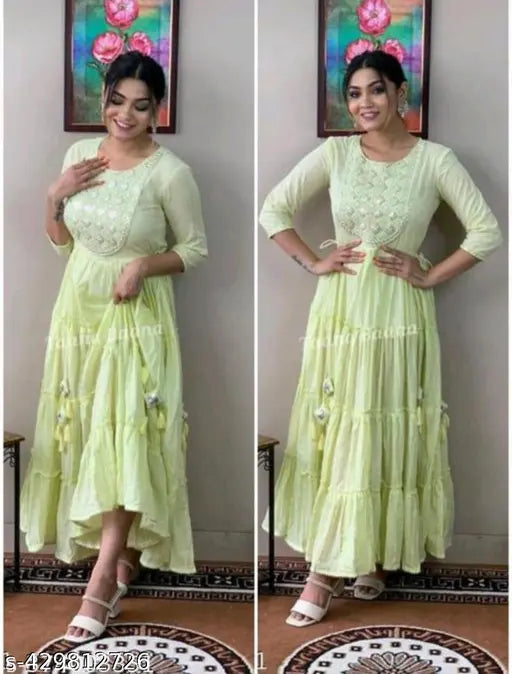 Light green LUREX embroidery flared gown for women, rayon fabric with three-quarter sleeves, embellished party wear on mannequin