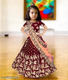 Embroidered taffeta silk lehenga choli with net dupatta for girls aged 0-15 years, Indian traditional clothing on display