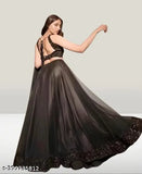 Embellished velvet Bollywood net Lahenga Choli with solid dupatta, semi-stitched Indian traditional wear on mannequin
