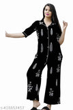 Black printed cotton night suit for women and girls, featuring solid print design. Comfortable sleepwear set with elastic waist and drawstring, suitable for lounging or fitness. Made in India