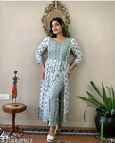 Rayon TANA BANA NYRA cut green kurta pant set, printed net design with three-quarter sleeves. Beautiful Indian dress in S, M, L, XL, XXXL sizes