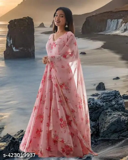 Premium export quality light pink & green lace gown with floral print, perfect for women and girls' parties or collage events. Long sleeves made from Georgette fabric, available in sizes S-XXXL. Made in India