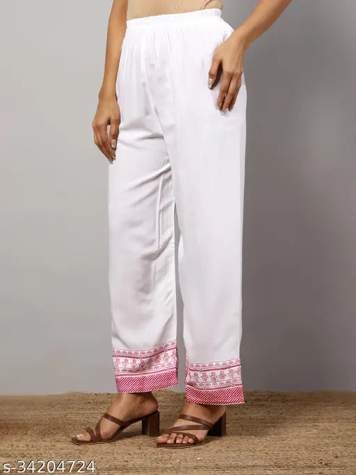 Fabulous cotton women's kurti set with palazzos, three-quarter sleeves, printed net design - Indian ethnic wear