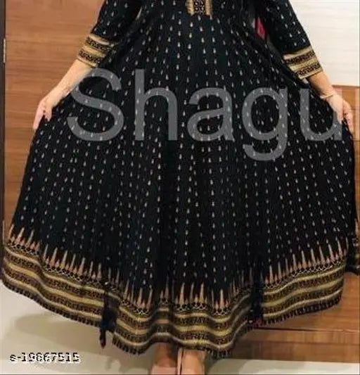 Printed rayon Anarkali kurtis with gold print, vibrant colors, three-quarter sleeves, round neckline, India