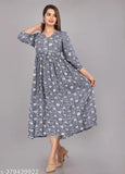 Rayon Women's printed pom-pom anarkali with three-quarter sleeves, featuring a casual and festive design. Available in multiple sizes: S-5XL (India)