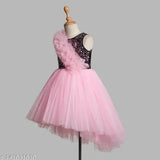 Pink net ruffle dress for girls party wear, asymmetrical design with embellishments. 1-2, 2-3, 8-9, 9-10 years sizes available