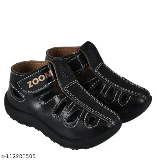 Leather and PVC closed-toe sandals for babies 6 months to 5 years in black color, perfect for outdoor wear. Made in India