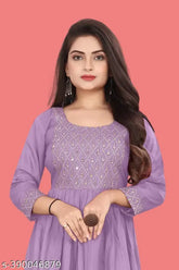 Trendy viscose rayon kurti, embroidered three-quarter sleeves for women's wardrobe, Indian origin