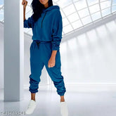 Women's luxury velvet pajama lounge set (hoodie & pants), cozy and trendy winterwear. Sumptuous velvet fabric, elastic waistband, long sleeves, hooded sweatshirt." (117 characters)