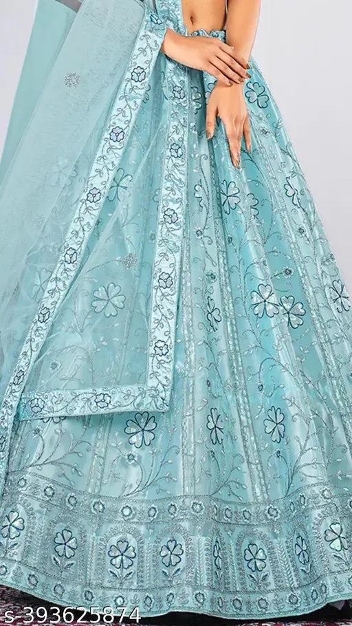 Elegant sky blue net semi-stitched Lehenga Choli & Dupatta with matching embellishments, perfect for special occasions like weddings