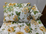 High-quality multicolor Glace cotton bedsheet set (1 King size + 2 embroidered pillow covers + 2 cushion covers with filler), botanical print. Ideal for AC rooms and adult use. Heavy Quality, 90x100 inches, 180 thread count