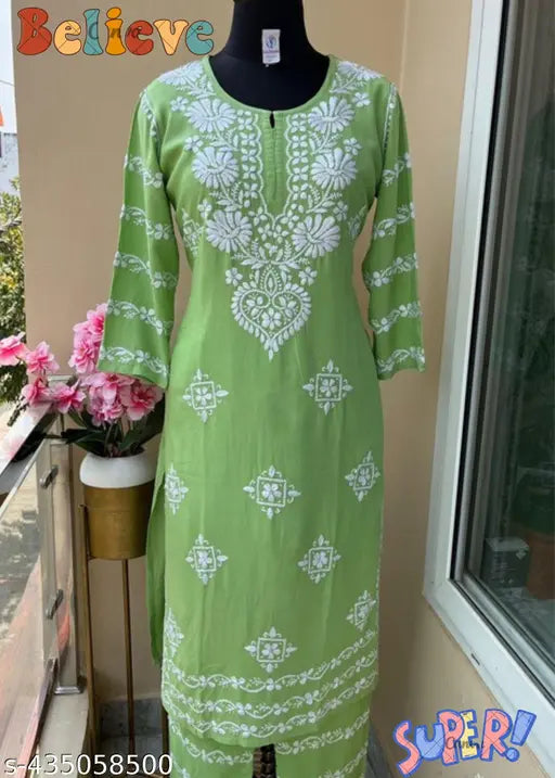 Rayon chikankari kurti and pants set, printed net design, three-quarter sleeves, Indian fabric on model
