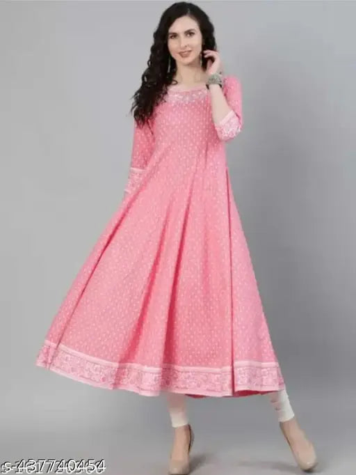 Peach silver embroidered rayon gown with three-quarter sleeves and printed combo, women's fashion wear on display stand