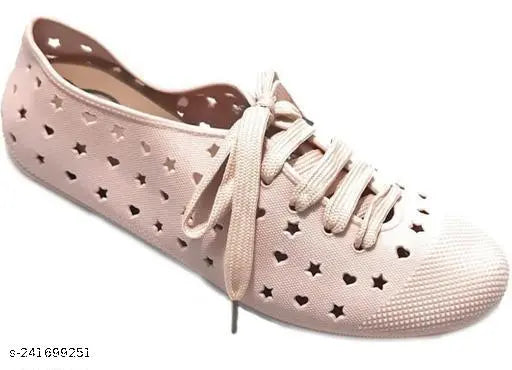 Modern rubber flip flops with lace up detail, textured net pattern for women's comfort and style. Available in various sizes: IND-3 to IND-10. Made in India