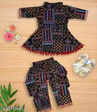 Printed black cotton blend dhoti pants and kurta set - traditional Indian girls' clothing with A-line top and short sleeves