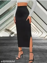 High-waisted black midi pencil skirt with side slit, made from polyester lycra. Versatile design for any occasion. Black elastic waist belt. Imported quality trending fashion clothing