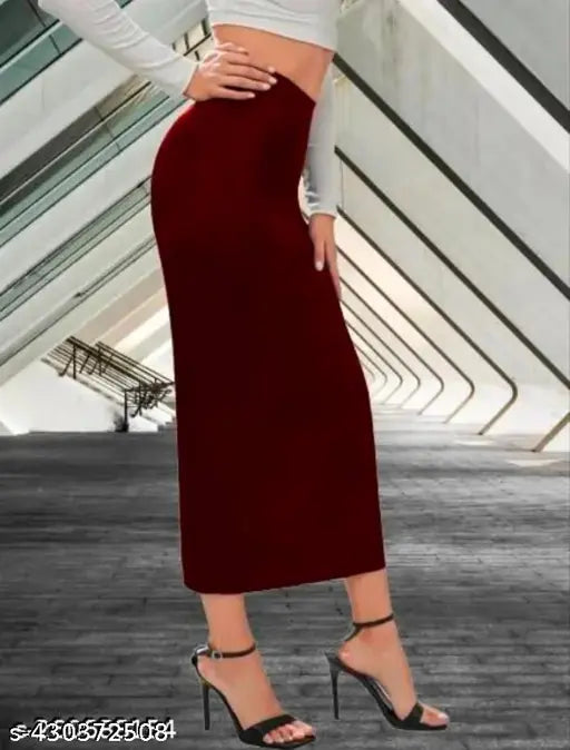 High-waisted polyester lycra midi skirt with side slit, elastic waist, and bodycon fit for women's party wear or casual outfits. Made in India