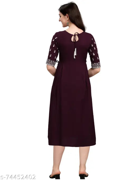 Embroidered rayon kurta in classic colors, three-quarter sleeves, festive or casual wear with relaxed fit and regular machine wash