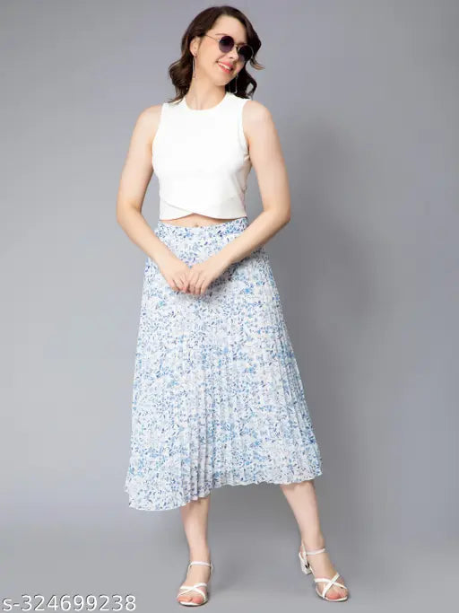 Sky blue georgette pleated skirt with floral print and elastic waist, perfect for women's fashion. Made in India