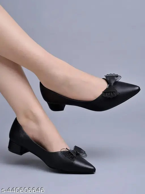 Black synthetic slip-on sandals, pointed toe with bow detail, for women & girls - Shoetopia India