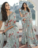 Floral printed georgette chiffon sari with lace border, art silk blouse on display stand, new Indian designer saree