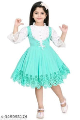 Green cotton kids' party dress, embroidered net design, three-quarter sleeves, knee-length