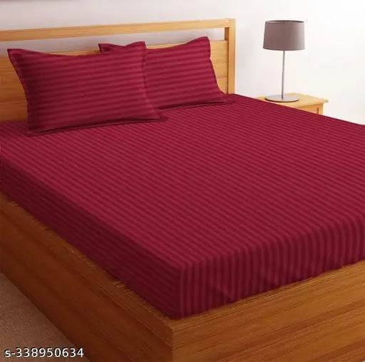 Maroon stripe cotton double bedsheet with two pillow covers, 90x100 inches and 18x28 inches. Superfine quality, reversible, easy to wash, trendy, long-lasting. Ideal for adult summer use on a double or big single bed