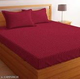 Maroon stripe cotton double bedsheet with two pillow covers, 90x100 inches and 18x28 inches. Superfine quality, reversible, easy to wash, trendy, long-lasting. Ideal for adult summer use on a double or big single bed